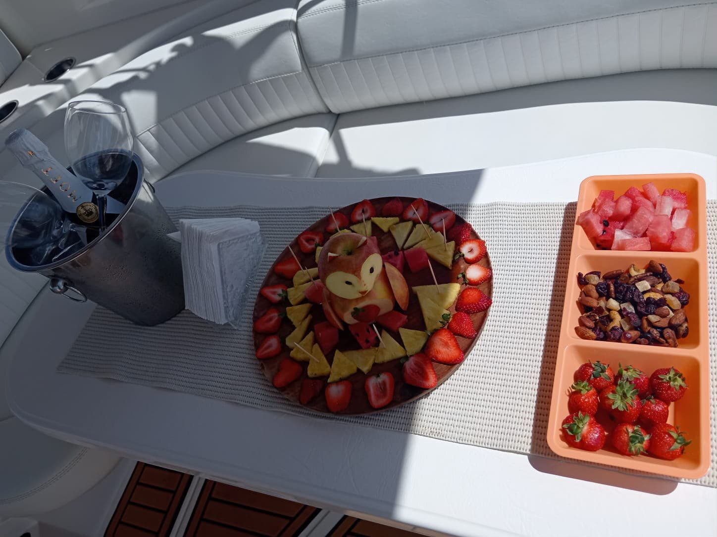 Fruit board and drinks prepared aboard a private yacht